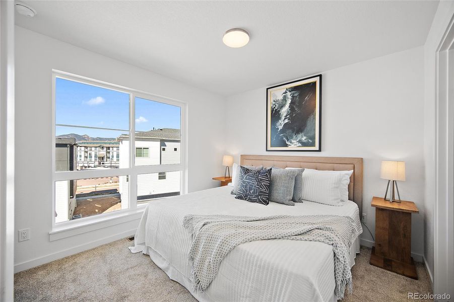 Furnished interior view inside a new home in The Commons at Victory Ridge, Colorado Springs (Image 17).