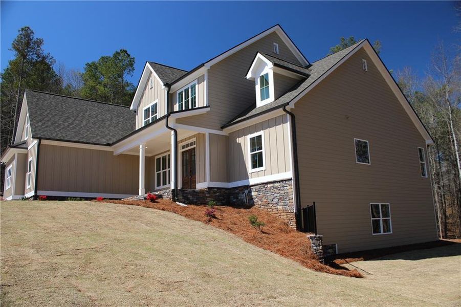 Front exterior of a new home in , Villa Rica, GA, highlighting curb appeal (Image 12). Front exterior of a new home in , Villa Rica, GA, highlighting curb appeal (Image 12).