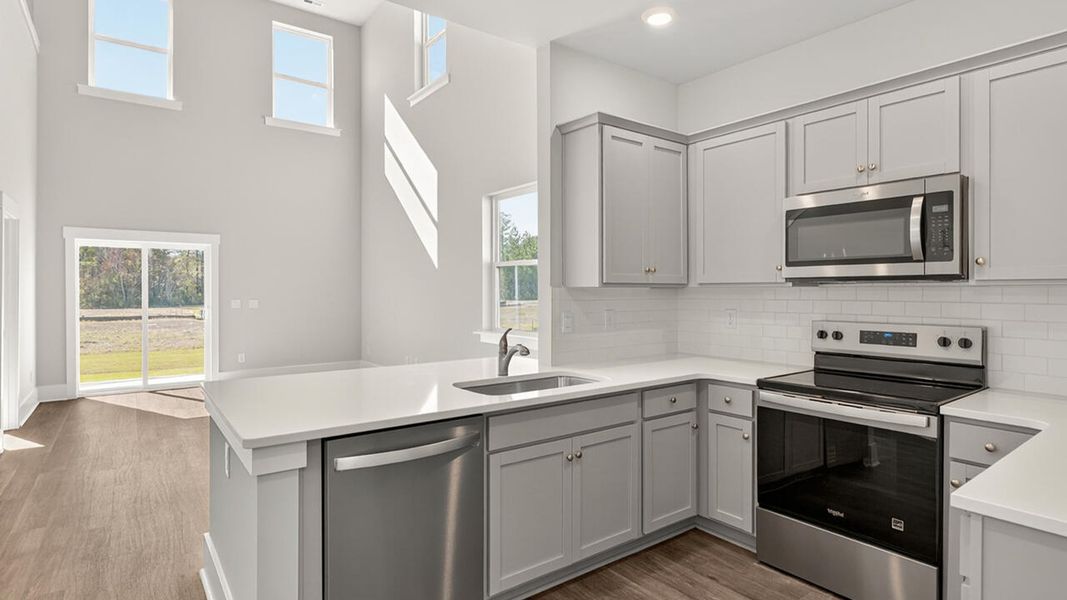 Furnished interior view inside a new home in Indigo Preserve Townhomes, Leland (Image 7).