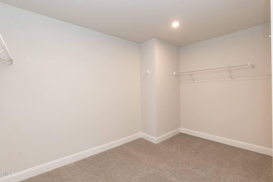 Representative unfurnished interior of a home built from the 2721 by Adams Homes in Hidden Pines, Cameron (Image 28).