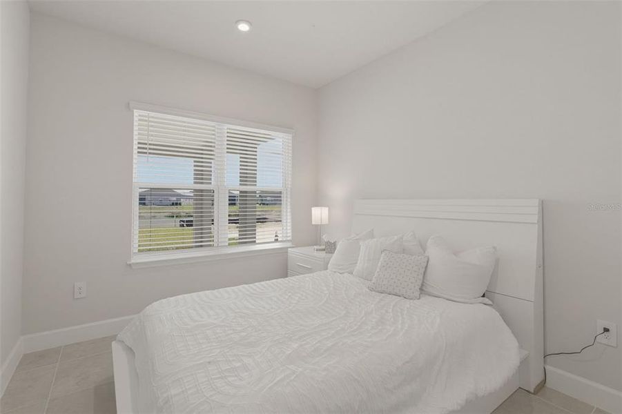 Furnished interior view inside a new home in West Port Single Family Homes, Port Charlotte (Image 18).