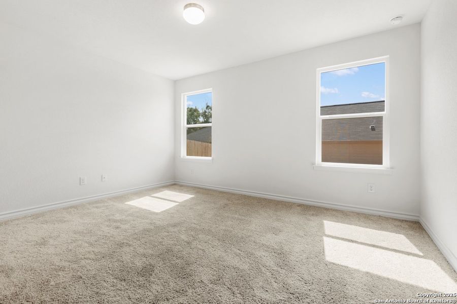 Spacious, unfurnished interior of a new home in Hidden Canyons at TRP, San Antonio (Image 5).