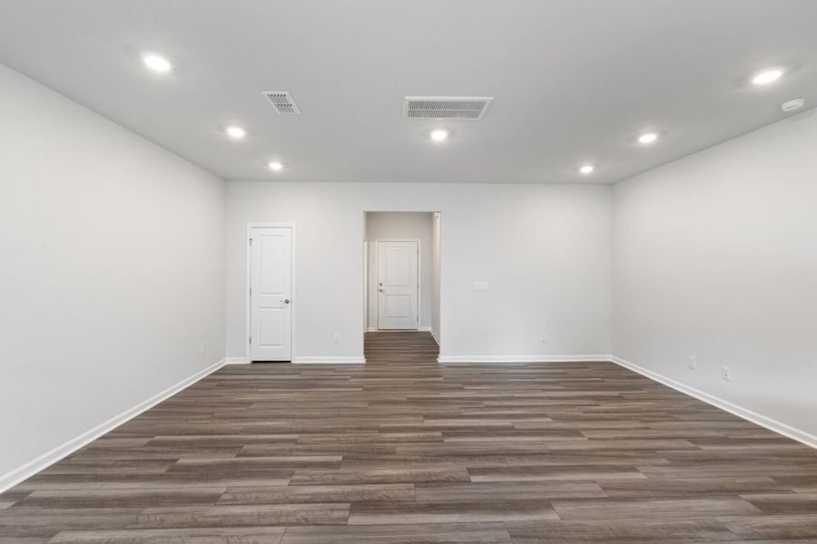 Spacious, unfurnished interior of a new home in Poets Walk, Whitsett (Image 22).