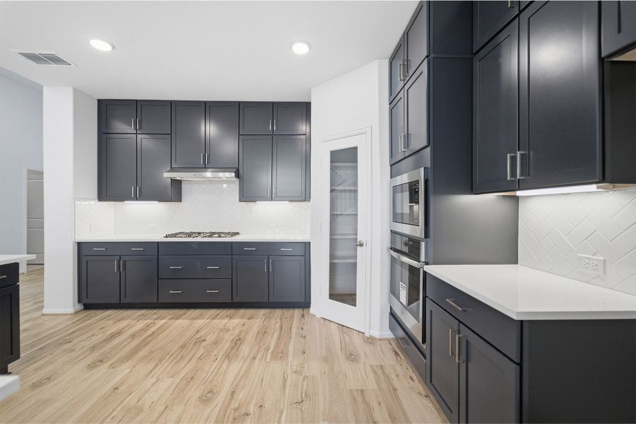 Furnished interior view inside a new home in Sunfield, Mustang Ridge (Image 11).