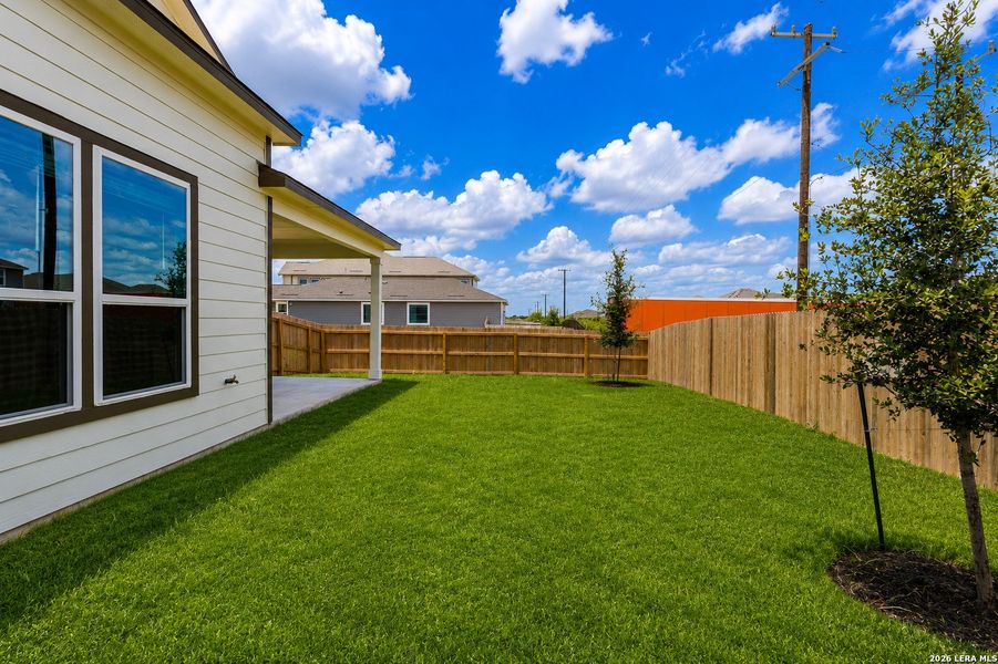 Exterior details and patio area of a home in Talley Fields, San Antonio (Image 4).