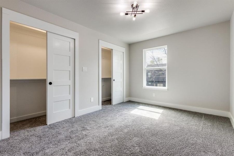 Unfurnished bedroom with carpet