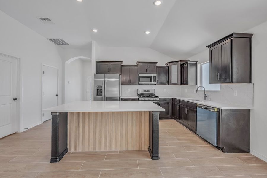 Representative furnished interior of a home built from the The Monica – 2012SSC by Saratoga Homes in Paseo Del Este, El Paso (Image 7).