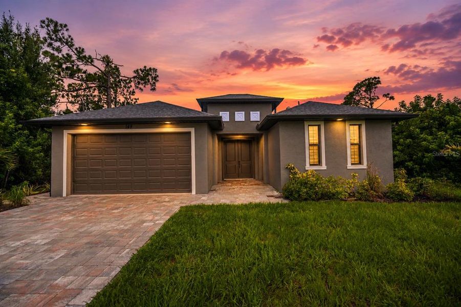 Front exterior of a new home in , Rotonda West, FL, highlighting curb appeal (Image 29). Front exterior of a new home in , Rotonda West, FL, highlighting curb appeal (Image 29).