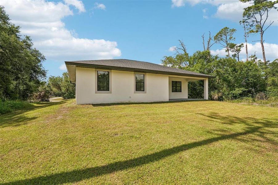 Exterior details and patio area of a home in , Port Charlotte (Image 30).
