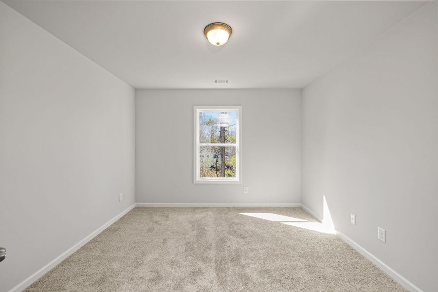 Bedroom #2 features a walk-in closet