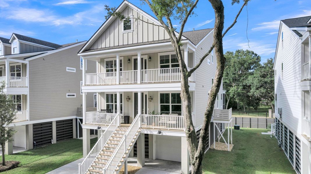 Front exterior of a new home in Wando Forest, Mount Pleasant, SC, highlighting curb appeal (Image 25).