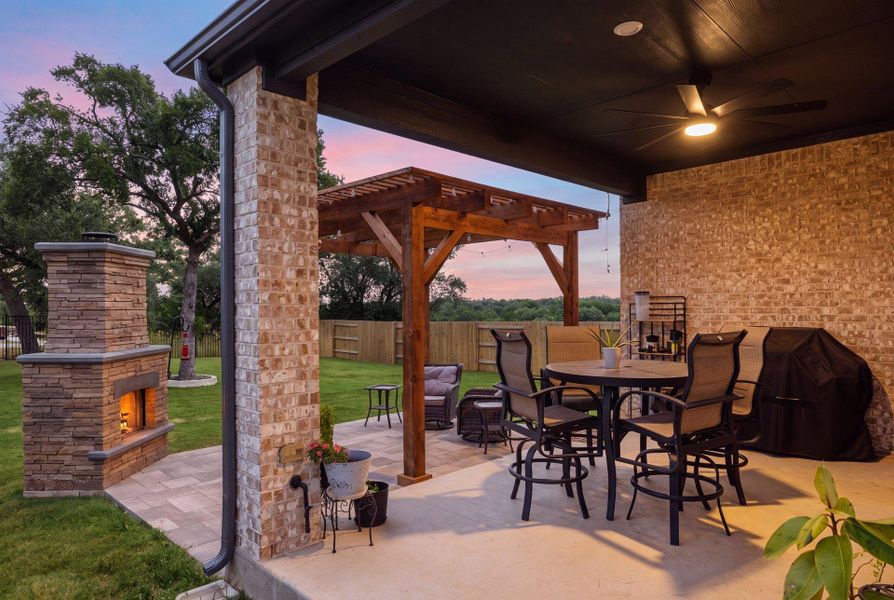 Covered pergola with outdoor fireplace. Covered pergola with outdoor fireplace.