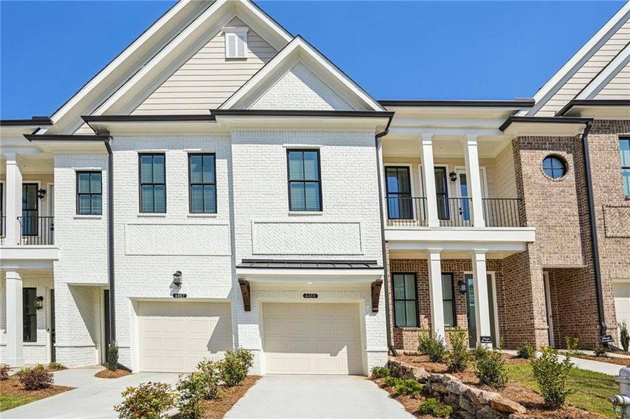 Front exterior of a new home in , Peachtree Corners, GA, highlighting curb appeal (Image 19).