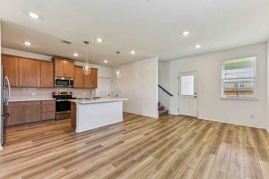 Furnished interior view inside a new home in Stonewall Ranch, Liberty Hill (Image 5).