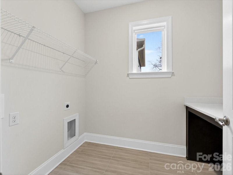 Spacious, unfurnished interior of a new home in North Creek Village, Huntersville (Image 32).