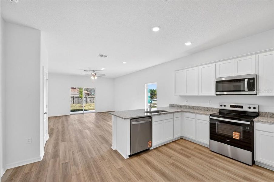Furnished interior view inside a new home in , Deltona (Image 8).