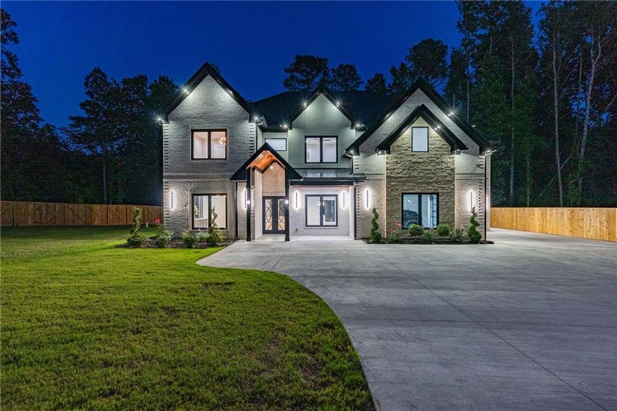 Front exterior of a new home in , Lawrenceville, GA, highlighting curb appeal (Image 31). Front exterior of a new home in , Lawrenceville, GA, highlighting curb appeal (Image 31).