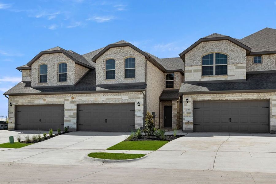Front exterior of a new home in Main Street Village, Mansfield, TX, highlighting curb appeal (Image 1). Front exterior of a new home in Main Street Village, Mansfield, TX, highlighting curb appeal (Image 1).