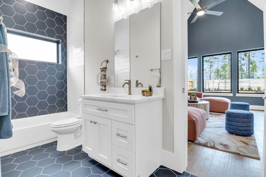 Furnished interior view inside a new home in ARTAVIA, Conroe (Image 26).