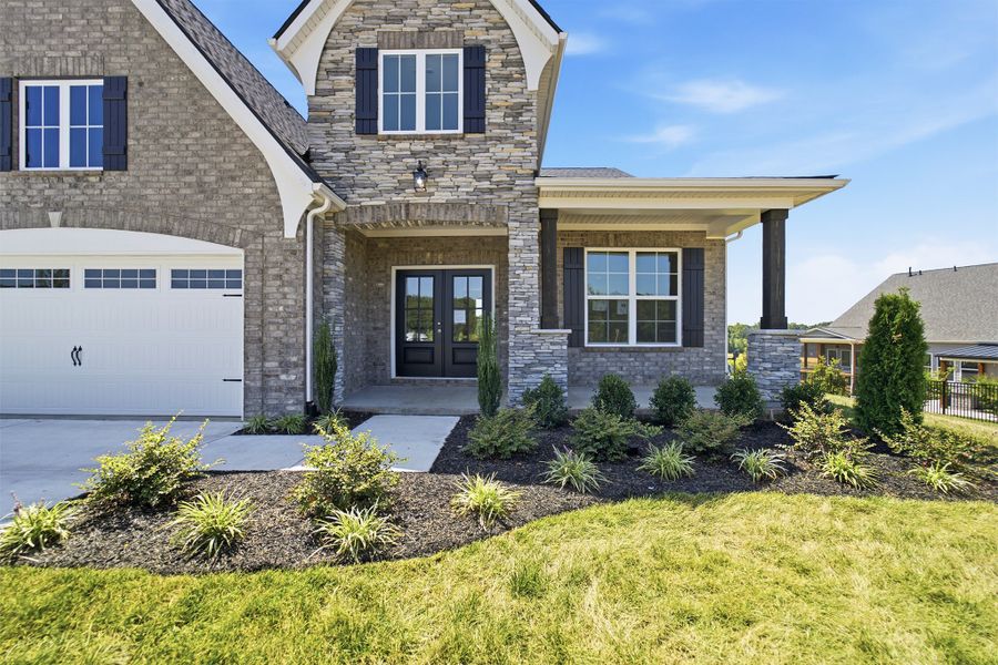 Exterior details and patio area of a home in Aden Woods, Fairview (Image 3).