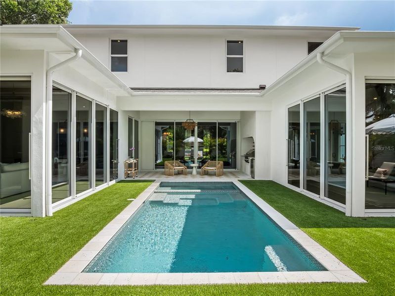 Exterior details and patio area of a home in , Winter Park (Image 35).