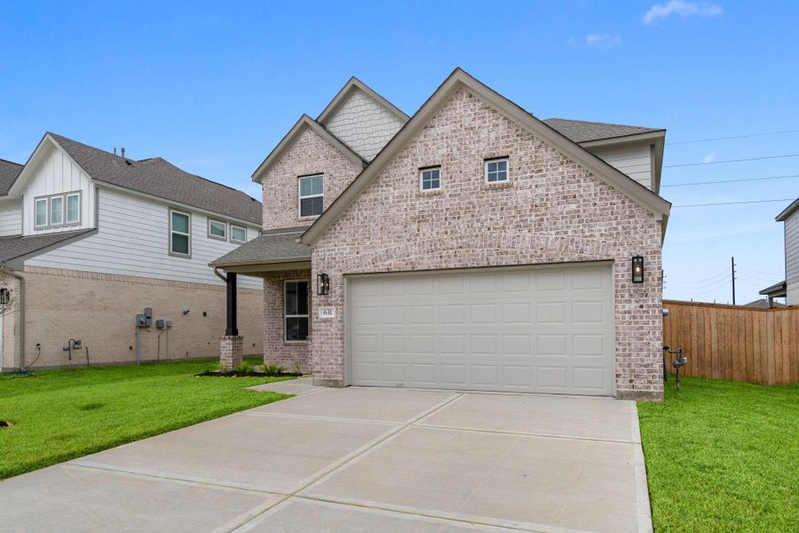 Front exterior of a new home in Huntington Place, Rosharon, TX, highlighting curb appeal (Image 1). Front exterior of a new home in Huntington Place, Rosharon, TX, highlighting curb appeal (Image 1).