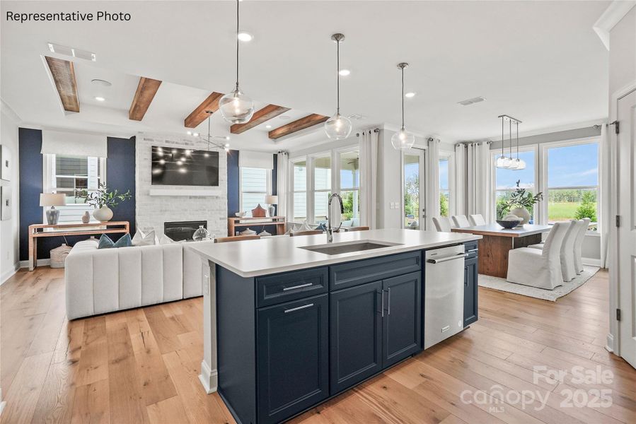 Open-concept kitchen, dining, and living area - perfect for entertaining! Open-concept kitchen, dining, and living area - perfect for entertaining!