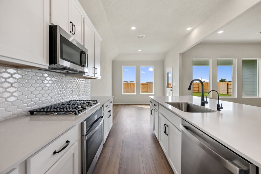 Representative furnished interior of a home built from the Manchester II by Ashton Woods in Lagos Reserve, Manor (Image 14).