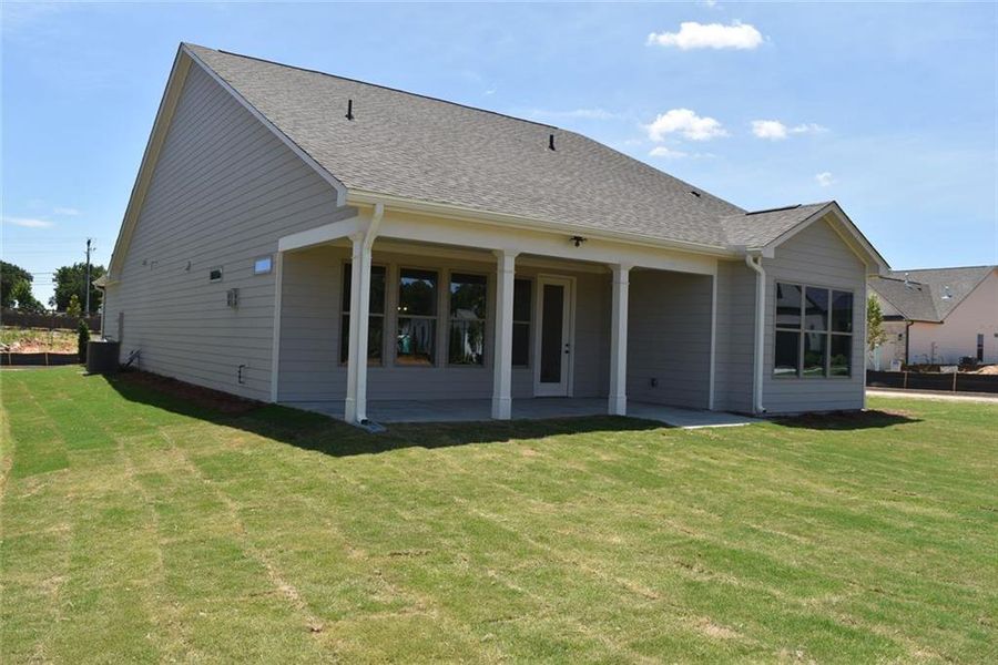 Exterior details and patio area of a home in Soleil Summit Chase, Snellville (Image 21).