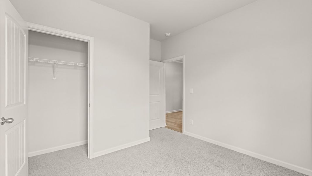 Representative unfurnished interior of a home built from the Cali by D.R. Horton in Sheffield Highlands, Dallas (Image 38).
