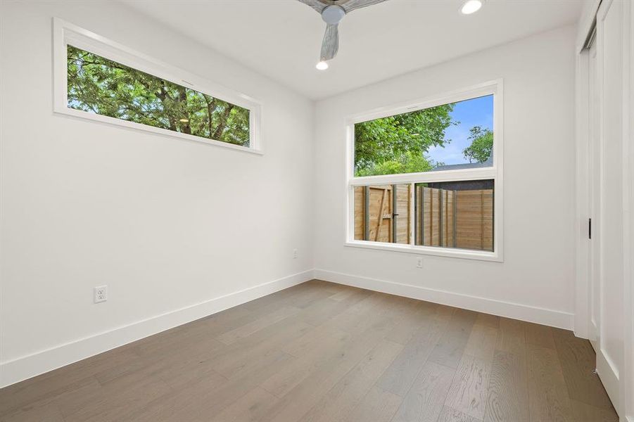 First level guest bedroom with full bathroom nearby.