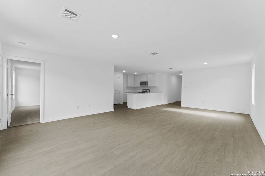 Spacious, unfurnished interior of a new home in Voss Farms: Watermill Collection, New Braunfels (Image 12).