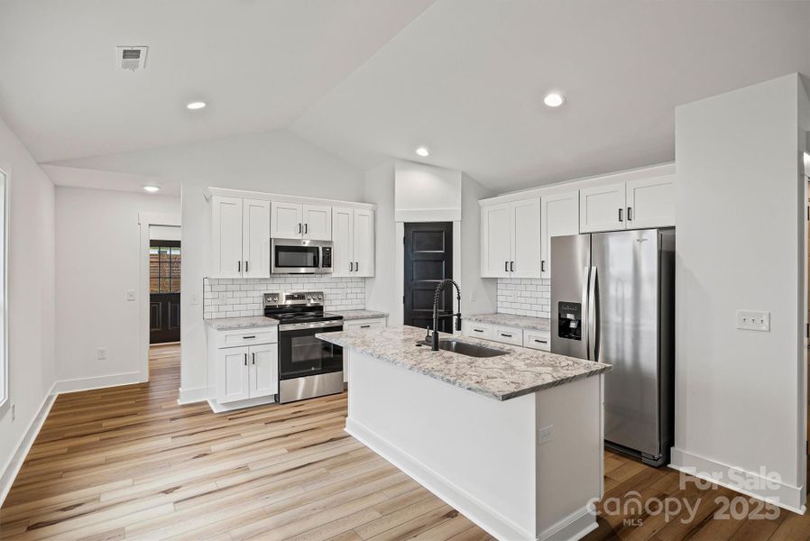 Furnished interior view inside a new home in , Concord (Image 9).