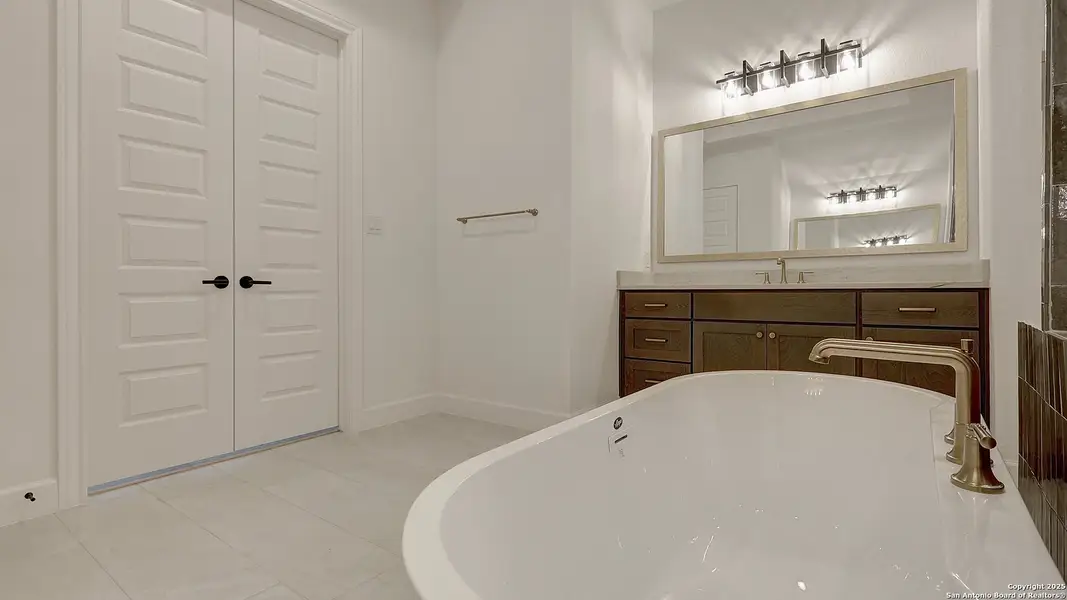 Furnished interior view inside a new home in The Dominion 70', San Antonio (Image 9).