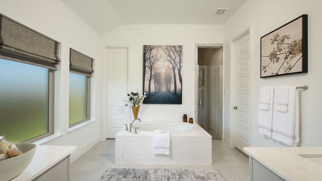Representative furnished interior of a home built from the 2935M by Perry Homes in Lakes of Cane Island, Katy (Image 17).