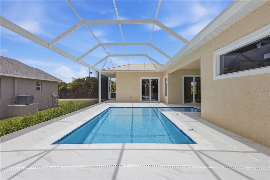Exterior details and patio area of a home in , Port Charlotte (Image 6). Exterior details and patio area of a home in , Port Charlotte (Image 6).