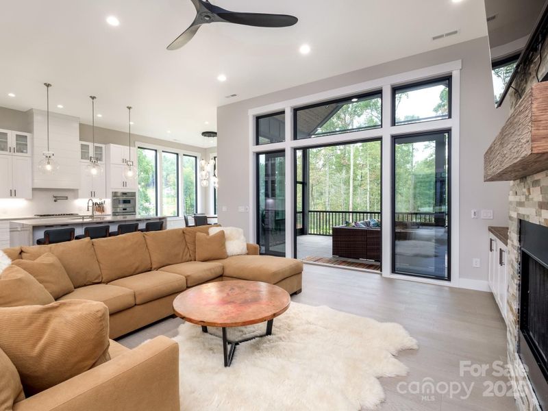 Great room opens into screened patio