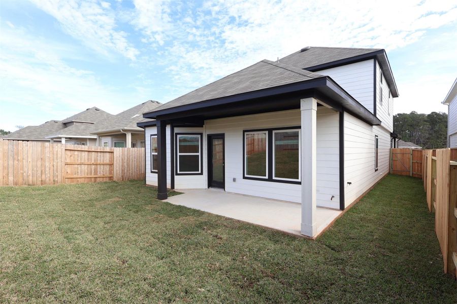 Exterior details and patio area of a home in Lone Star Landing, Montgomery (Image 4).