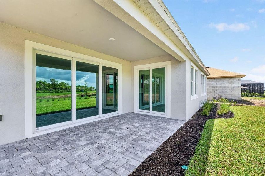 Exterior details and patio area of a home in The Sanctuary – Royal Collection, Punta Gorda (Image 21). Exterior details and patio area of a home in The Sanctuary – Royal Collection, Punta Gorda (Image 21).