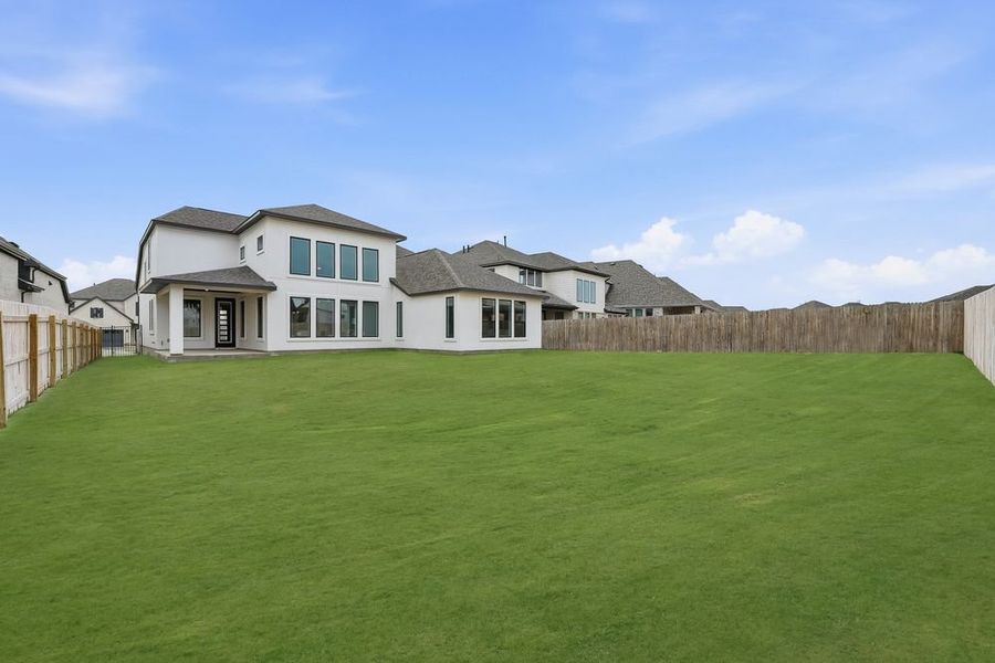 Exterior details and patio area of a home in Santa Rita Ranch, Liberty Hill (Image 3).