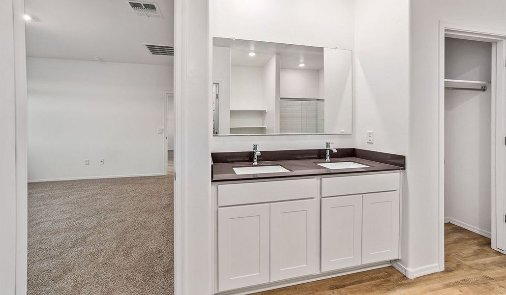Representative furnished interior of a home built from the Dalea by D.R. Horton in Barnett Village, Marana (Image 11).