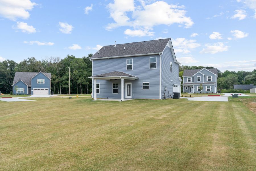 Front exterior of a new home in Stillwater, Tullahoma, TN, highlighting curb appeal (Image 19). Front exterior of a new home in Stillwater, Tullahoma, TN, highlighting curb appeal (Image 19).