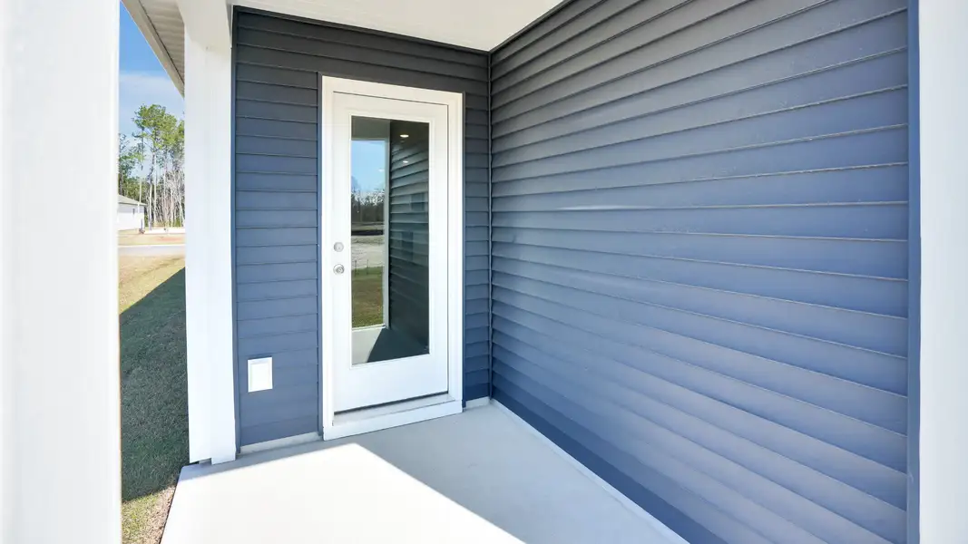 Exterior details and patio area of a home in Lockwood Landing, Supply (Image 2). Exterior details and patio area of a home in Lockwood Landing, Supply (Image 2).