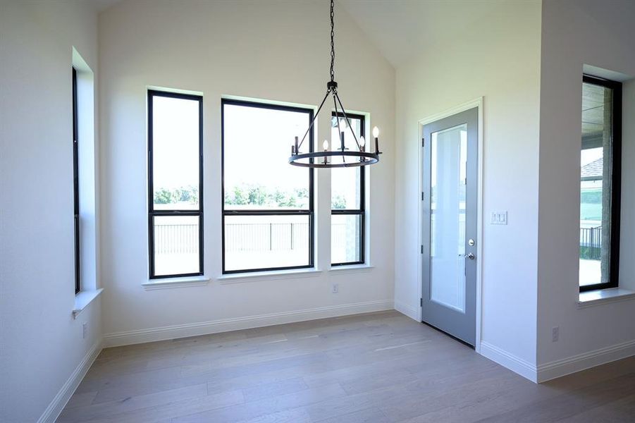 Breakfast Nook overlooking the backyard and golf course