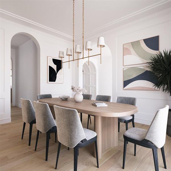 Dining room with arched walkways, light wood-style flooring, crown molding, and a chandelier