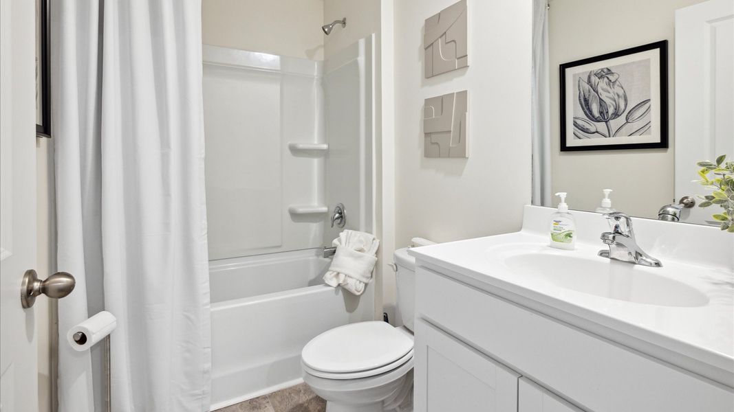Representative furnished interior of a home built from the Sullivan by D.R. Horton in Crescent Ridge, Niota (Image 10).