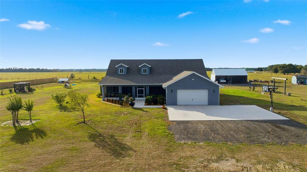 Front exterior of a new home in , Dade City, FL, highlighting curb appeal (Image 26).