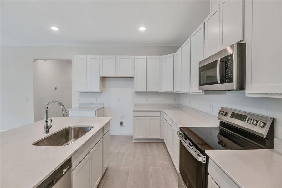 Furnished interior view inside a new home in , Winter Haven (Image 5). Furnished interior view inside a new home in , Winter Haven (Image 5).