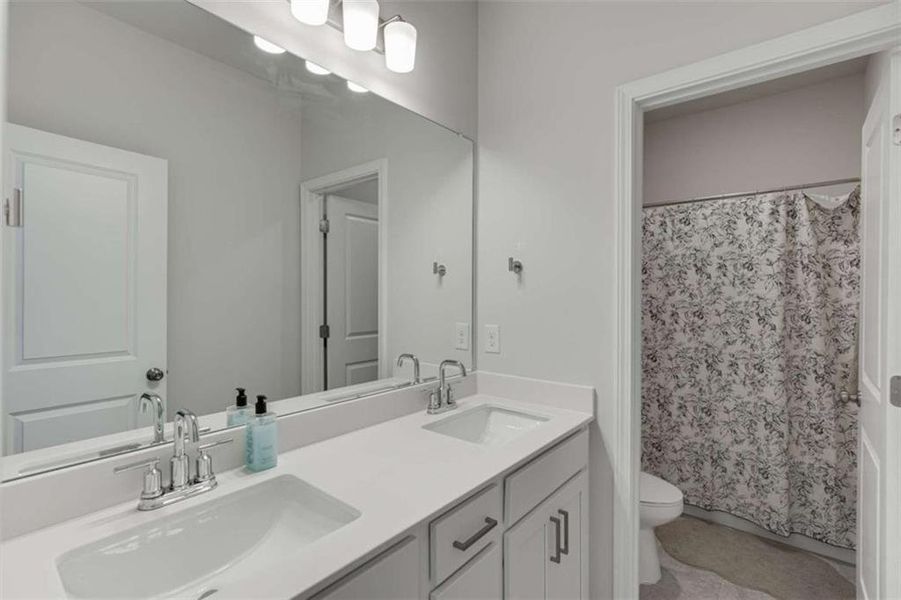 Furnished interior view inside a new home in Overlook at Lanier, Buford (Image 14).