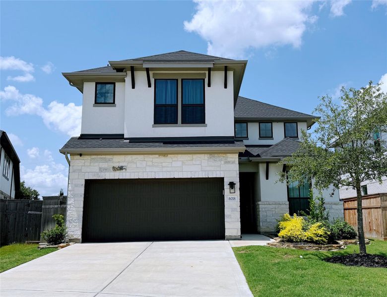 Front exterior of a new home in , Fulshear, TX, highlighting curb appeal (Image 22).